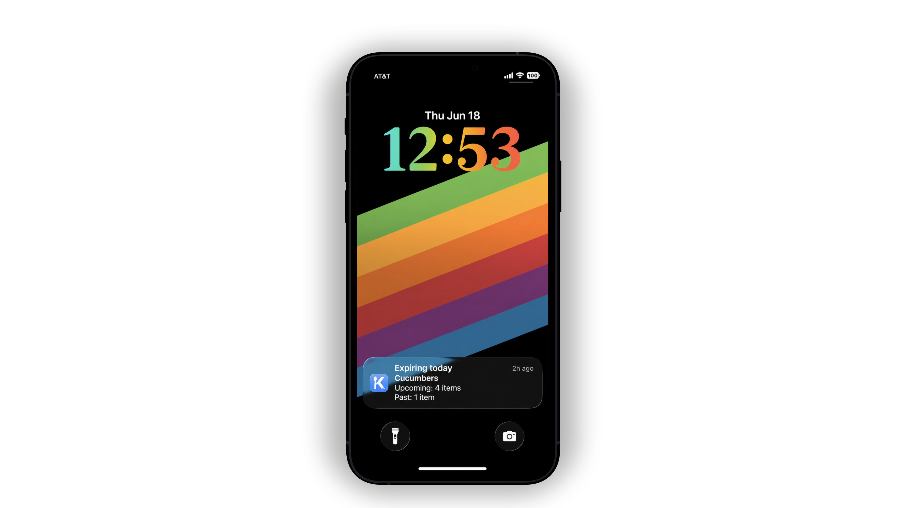 An iPhone lock screen showing a KitchenKit notification for groceries expiring today.